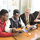 Allad Abdulle Alasow aus Somalia, sowie seinen 17-jähriger Landsmann Abdimajid Said Ahmed im Gespräch mit HWK Präsident Hans-Peter Rauch und HWK-Hauptgeschäftsführer Ulrich Wagner. 
